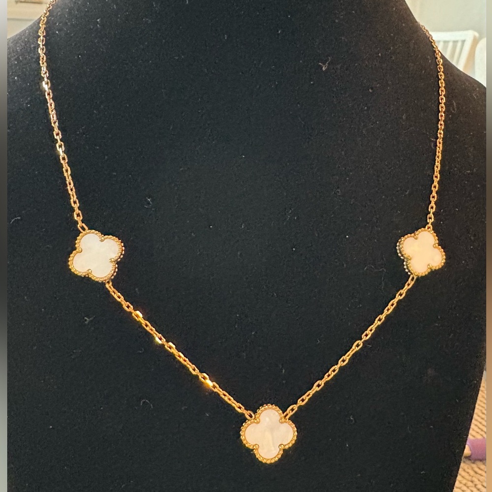 Simple, classic 3 off white clover necklace with stainless steel chain.